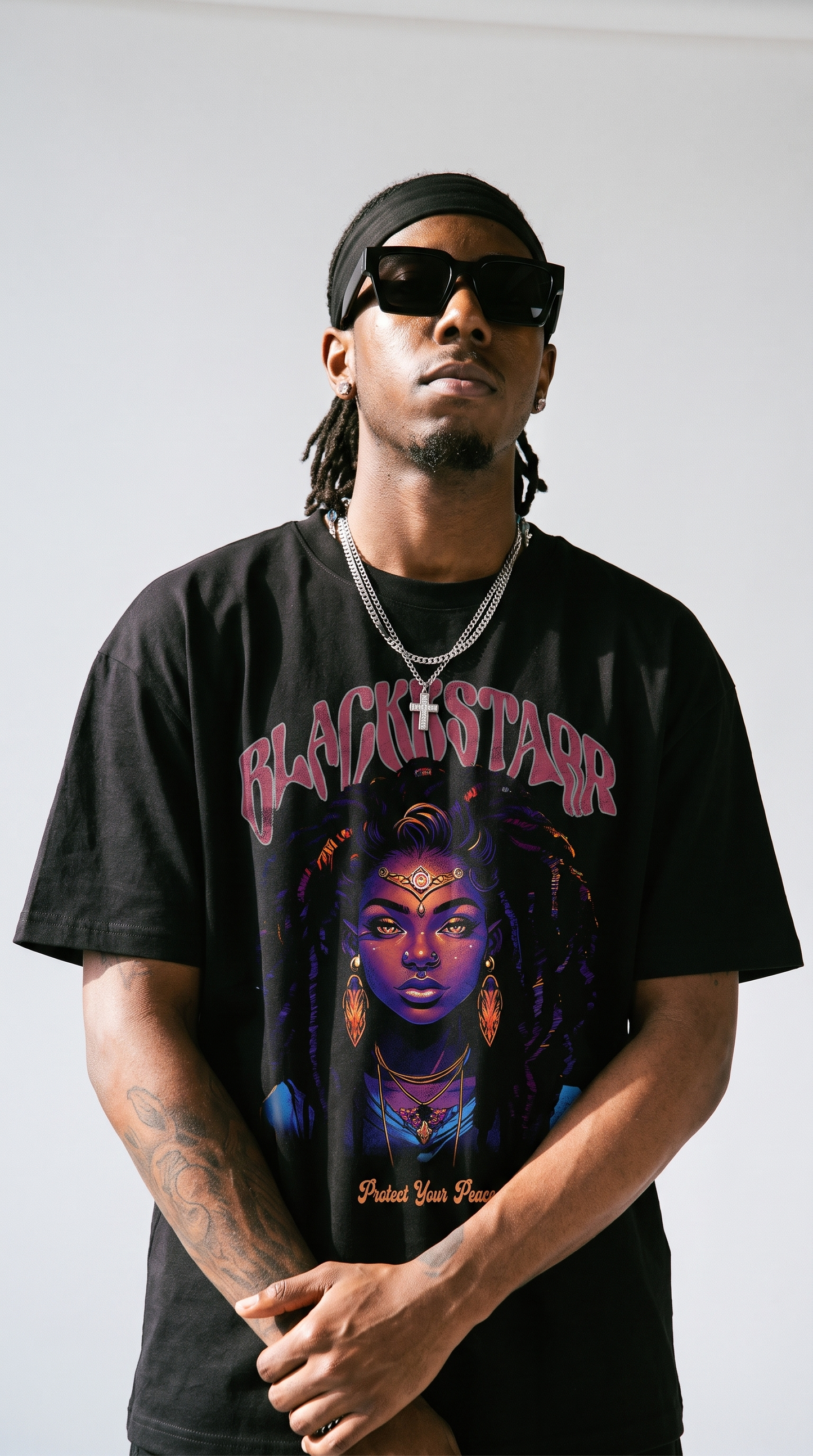 Protect Your Peace tee — arms crossed, front