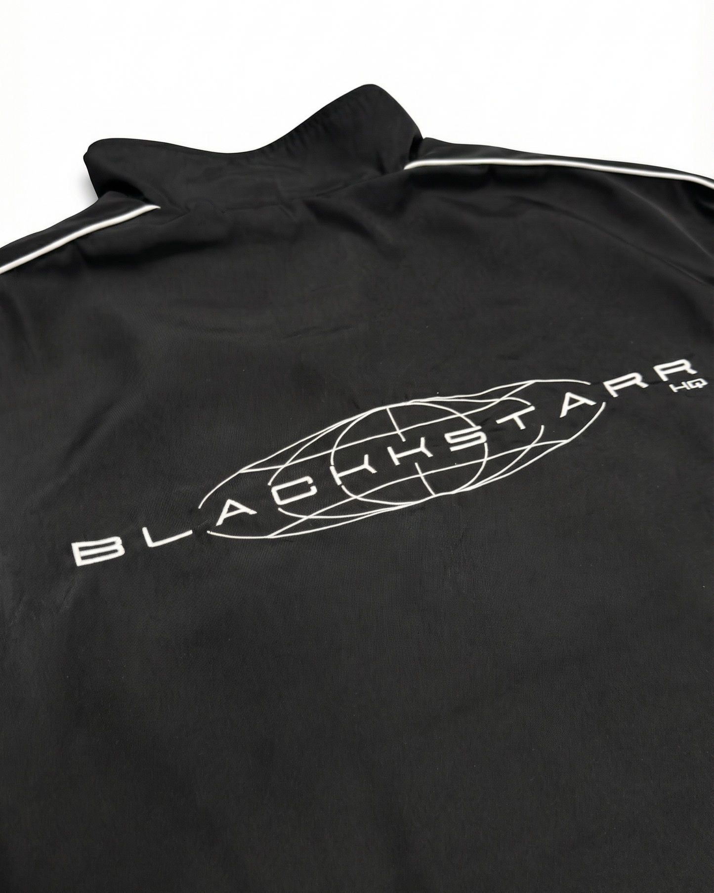 Black jacket with Blackstarr logo on a white background