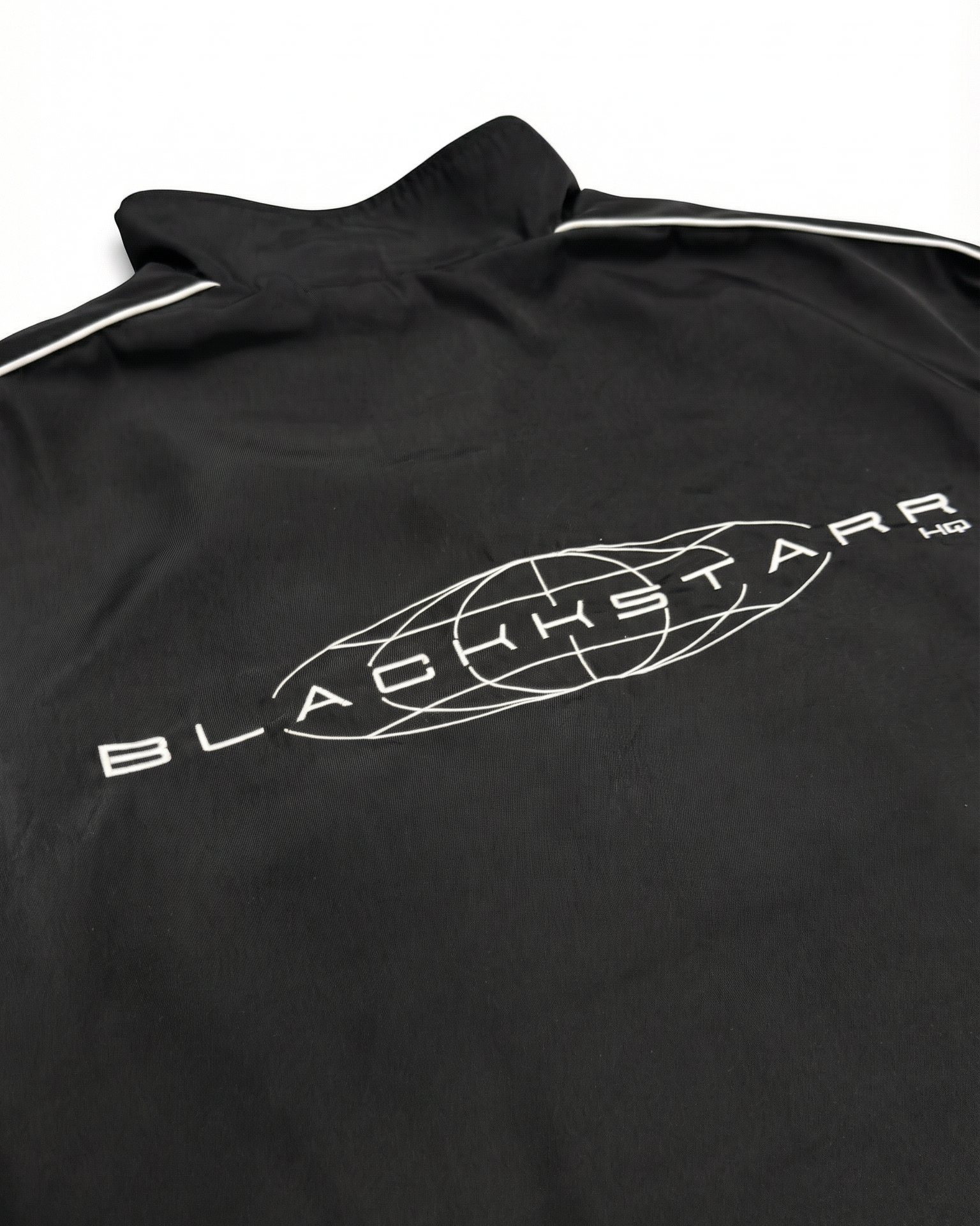 Black jacket with Blackstarr logo on a white background
