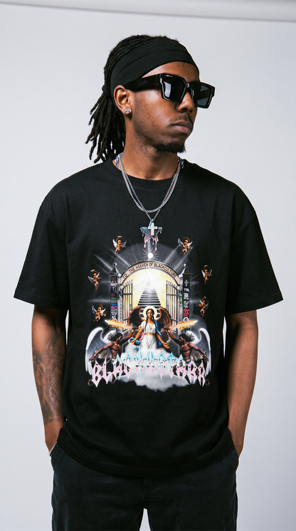Divine by Design tee — hands in pockets, relaxed