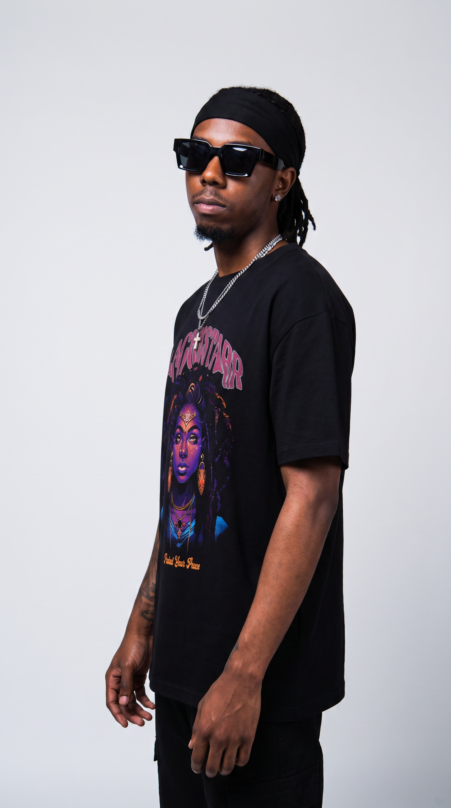 Protect Your Peace tee — three-quarter profile, oversized fit