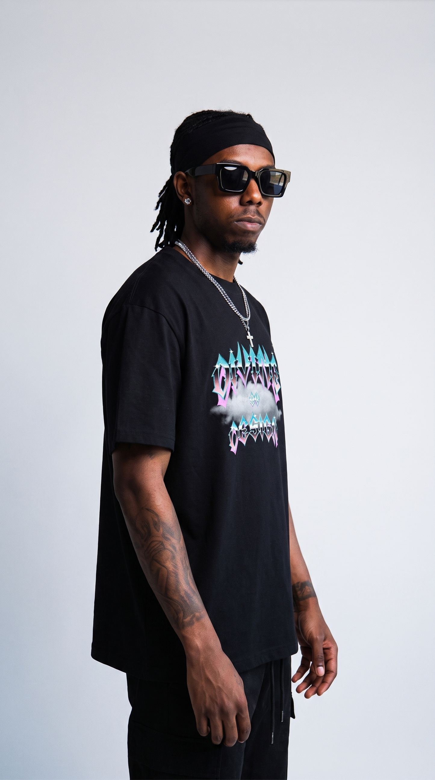 Divine by Design Type tee — three-quarter profile, oversized fit